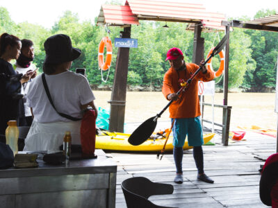 Students on Mangrove Tour receiving instruction