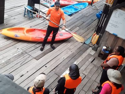 Students on Mangrove Tour receiving instruction